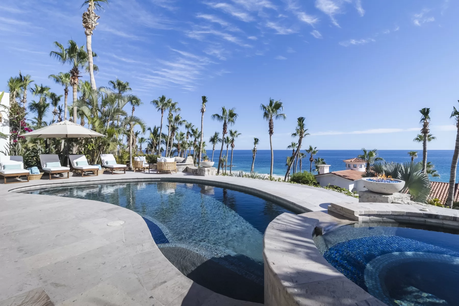 Casa Sirena luxury villa in Palmilla, Los Cabos featuring a private swimming pool, outdoor terrace, tropical landscaping, and elegant resort-style surroundings.