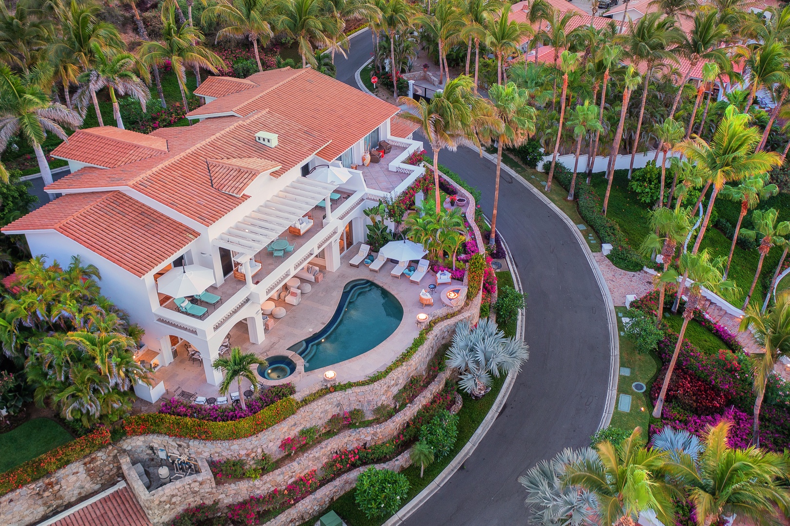 Luxury Casa Sirena villa in Palmilla, Cabo San Lucas, Mexico featuring a private swimming pool, tropical landscaping, expansive outdoor terraces, and elegant architecture within the exclusive Palmilla Resort community.